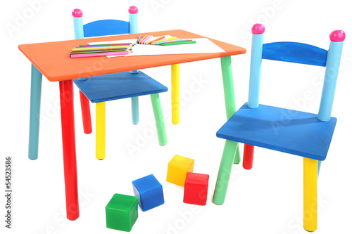 Photo: Small and colorful table and chairs for little kids isolated Small and colorful table and chairs for little kids isolated
