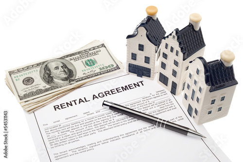 Photo: House with rental agreement and cash House with rental agreement and cash