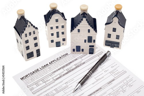 Photo: House with mortgage loan application House with mortgage loan application