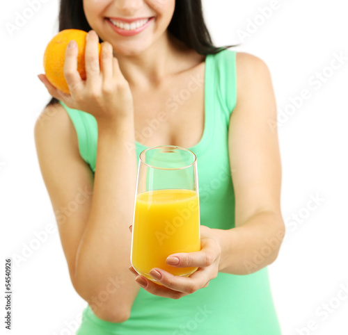 Photo: Girl with fresh juice and orange isolated on white Girl with fresh juice and orange isolated on white