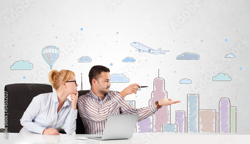 Photo: Businessman and businesswoman with colorful city sky-scape backg Businessman and businesswoman with colorful city sky-scape backg