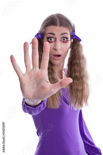Photo: Eine Frau wehrt sich - isoliert mit der Hand vor dem Gesicht Eine Frau wehrt sich - isoliert mit der Hand vor dem Gesicht