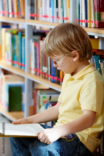 Photo: Reading in library Reading in library