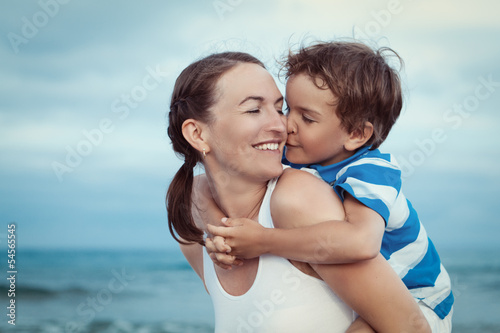 Photo: Portrait of happy mother and son at sea Portrait of happy mother and son at sea