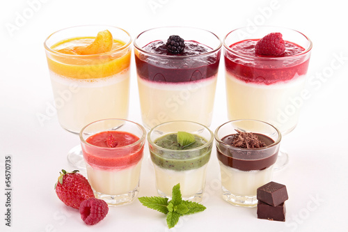 Photo: assortment of pannacotta isolated assortment of pannacotta isolated