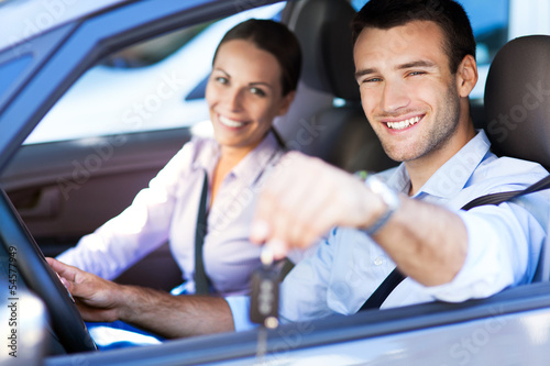 Photo: Couple inside car Couple inside car