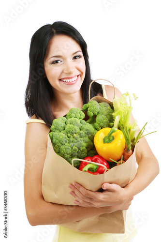 Photo: Girl with package of food isolated on white Girl with package of food isolated on white