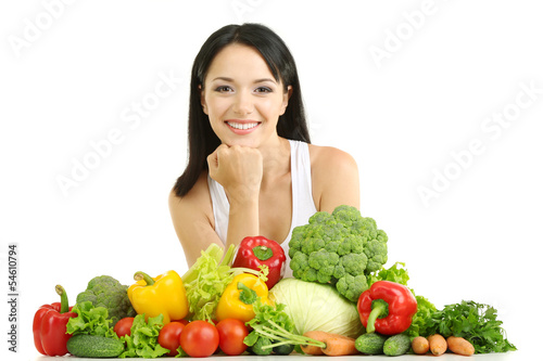 Photo: Girl with vegetables isolated on white Girl with vegetables isolated on white