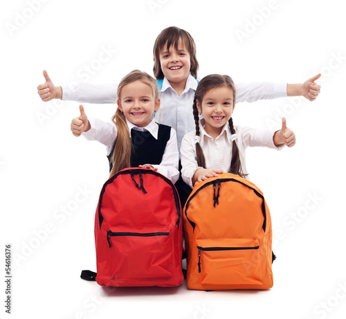 Photo: Back to school concept with happy kids Back to school concept with happy kids