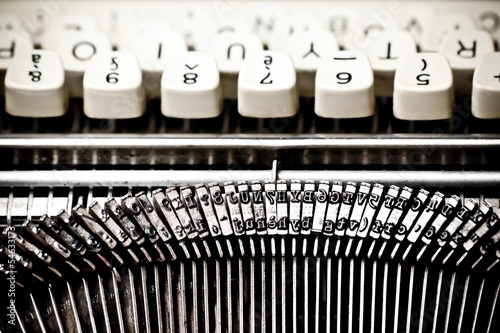 Photo: type bars and white buttons of typewriter type bars and white buttons of typewriter