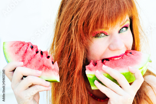 Photo: girl enjoying watermelon girl enjoying watermelon