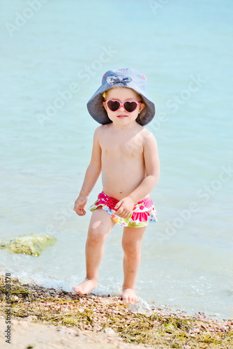 Photo: toddler girl on beach toddler girl on beach