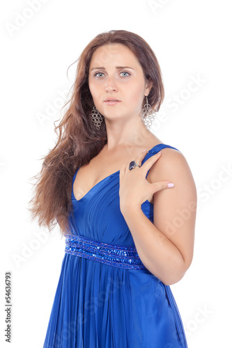 Photo: Portrait of a beautiful young woman in blue dress Portrait of a beautiful young woman in blue dress