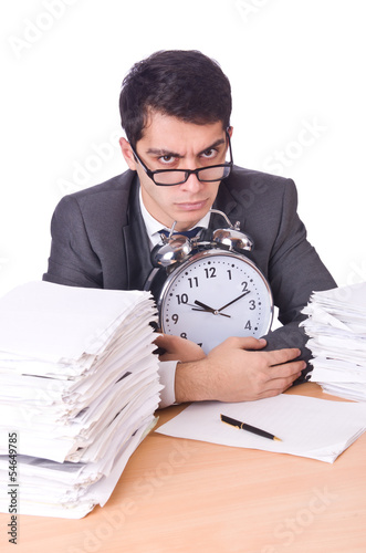 Photo: Woman businessman with giant alarm clock Woman businessman with giant alarm clock