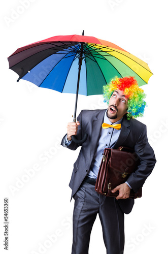 Photo: Clown businessman isolated on white Clown businessman isolated on white