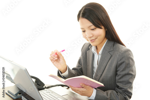 Photo: 笑顔の女子社員 笑顔の女子社員