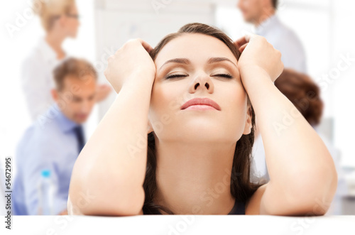 Photo: stressed businesswoman in office stressed businesswoman in office