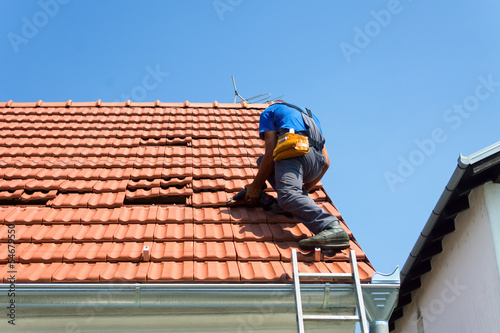 Photo: Worker on the roof Worker on the roof