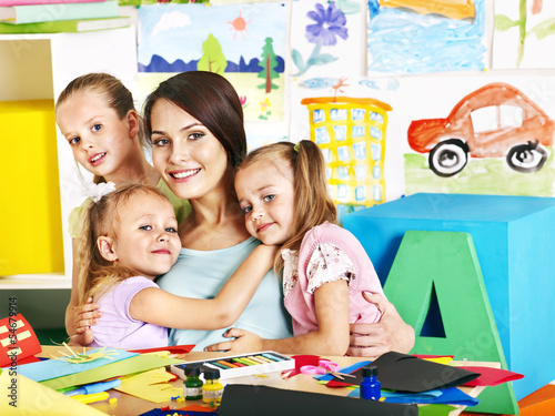Photo: Children with teacher at school. Children with teacher at school.