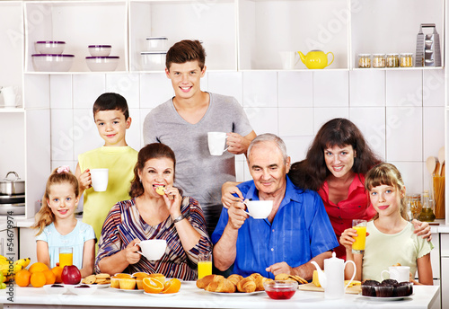 Photo: Big happy family have breakfast. Big happy family have breakfast.