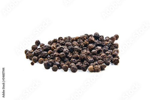 Photo: Black pepper isolated on the white background Black pepper isolated on the white background