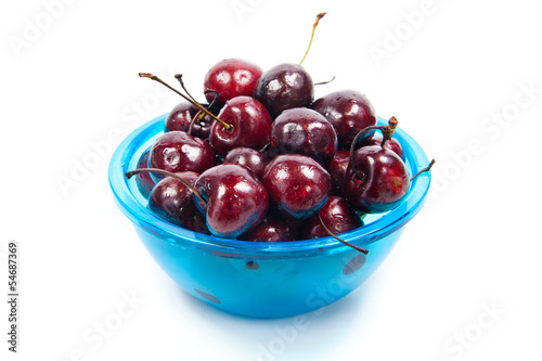 Photo: Fresh cherries in bowl isolated on white Fresh cherries in bowl isolated on white