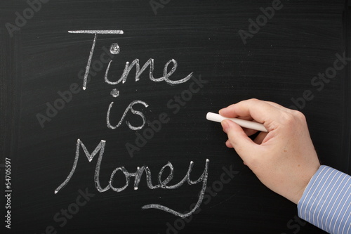 Photo: Time is Money on a blackboard Time is Money on a blackboard