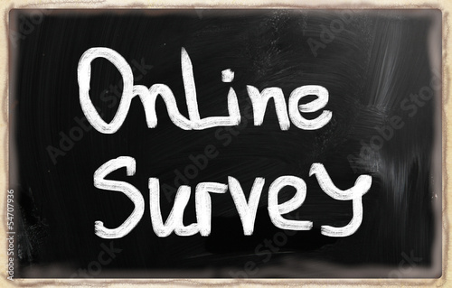 Photo: Online survey handwritten with chalk on a blackboard Online survey handwritten with chalk on a blackboard