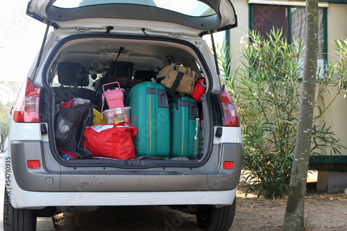 Photo: Car full of suitcases and bags Car full of suitcases and bags