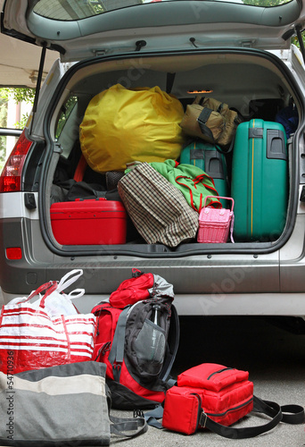 Photo: car full of luggage bags and travel bags car full of luggage bags and travel bags