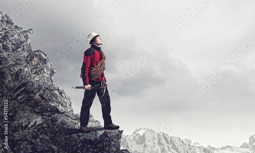 Photo: Young tourist atop of mountain Young tourist atop of mountain
