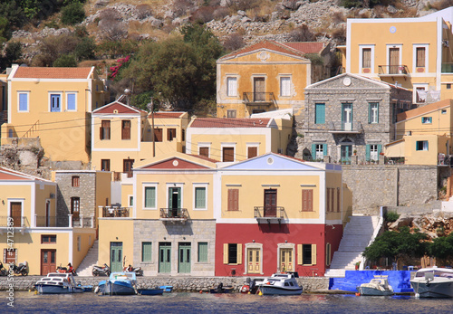 Photo: Colorful Symi Houses and Wooden Greek Boats Colorful Symi Houses and Wooden Greek Boats