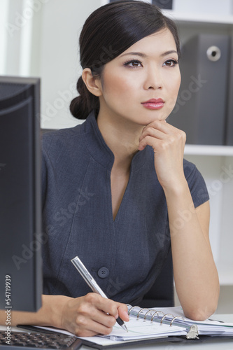 Photo: Asian Chinese Woman or Businesswoman in Office Asian Chinese Woman or Businesswoman in Office