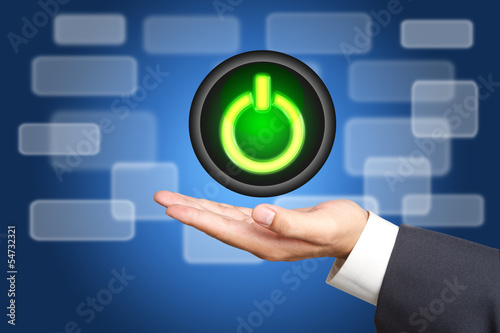 Photo: power button Interface on Business hand power button Interface on Business hand