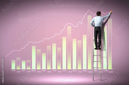 Photo: businessman drawing diagram businessman drawing diagram