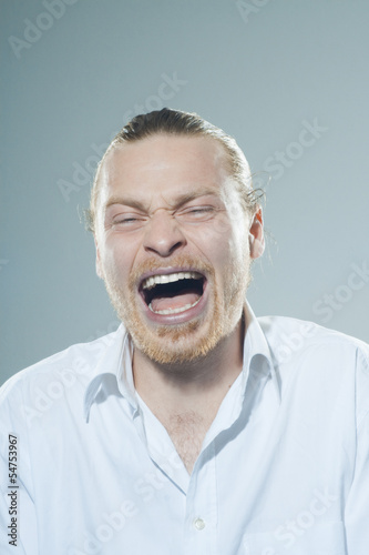 Photo: Laughing young man Laughing young man