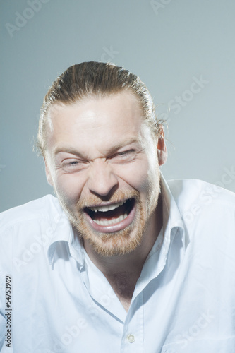 Photo: Laughing young man Laughing young man