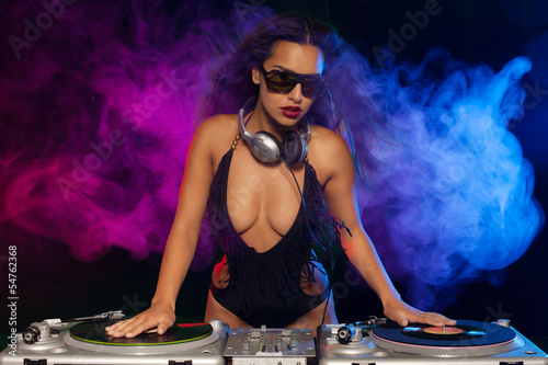 Photo: Beautiful DJ girl on decks on the party, Beautiful DJ girl on decks on the party,