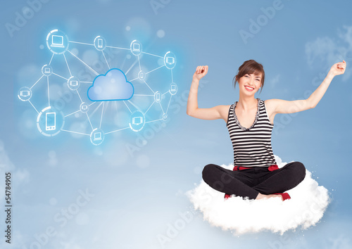 Photo: Happy woman sitting on cloud with cloud computing Happy woman sitting on cloud with cloud computing