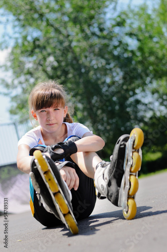 Photo: Young girl wearing rollerblades Young girl wearing rollerblades