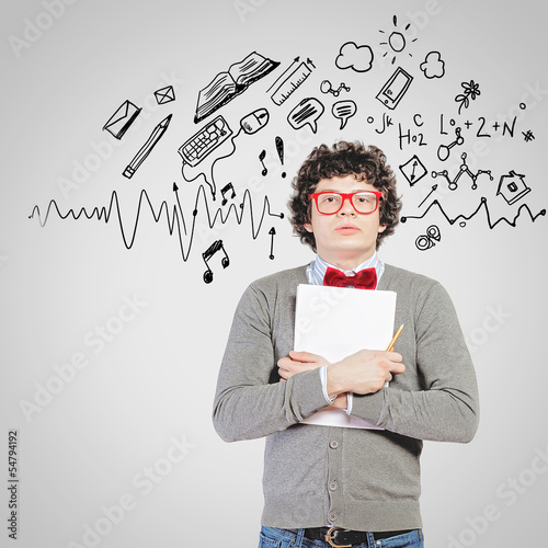 Photo: Young man with papers Young man with papers