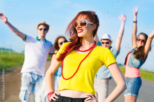 Photo: stylish young woman in sunglasses stylish young woman in sunglasses