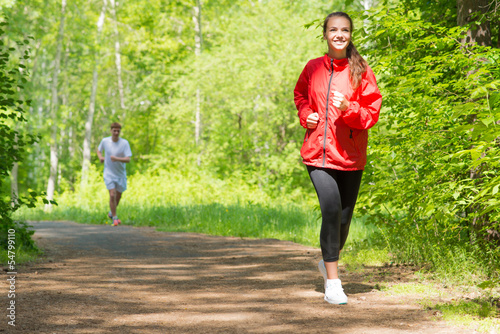 Photo: healthy young female athlete running healthy young female athlete running