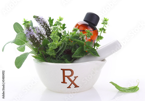 Photo: Porcelain mortar with rx symbol and fresh herbs Porcelain mortar with rx symbol and fresh herbs