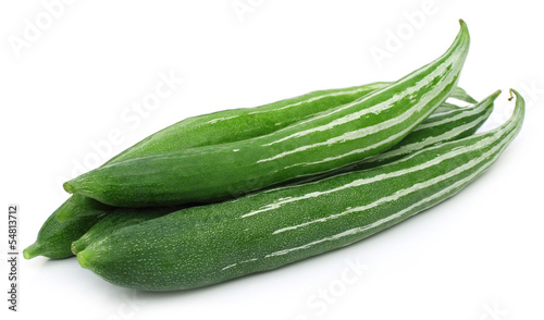 Photo: Snake gourd over white background Snake gourd over white background
