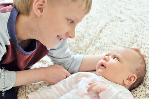 Photo: brother glad to see baby sister brother glad to see baby sister