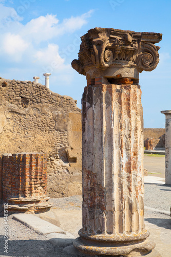 Photo: antique stone statue. at the ancient Roman city of Pompeii antique stone statue. at the ancient Roman city of Pompeii