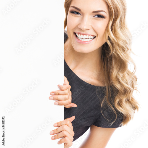 Photo: Businesswoman showing blank signboard, isolated Businesswoman showing blank signboard, isolated