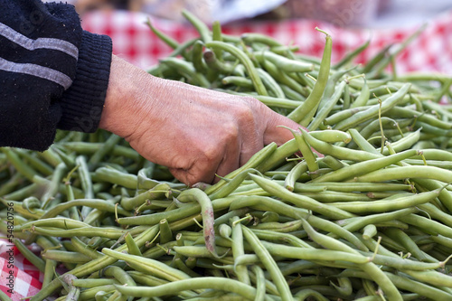 Photo: Green beans on a vegetable market store Green beans on a vegetable market store
