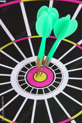 Photo: Target with darts close-up Target with darts close-up